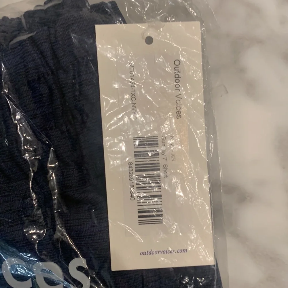 Sunday 7” navy short, NWT, XS